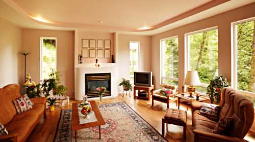 Living room area composed of 2 sofas upholstered in natural sand color